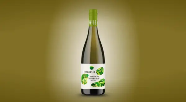 A bottle of Tumbleweed Sauvignon Blanc, a dry white wine from South Africa, with a green cap and a label featuring abstract green leaf patterns.