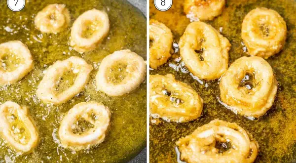 Golden brown rabas fritas sizzle in hot oil, ready to be enjoyed.