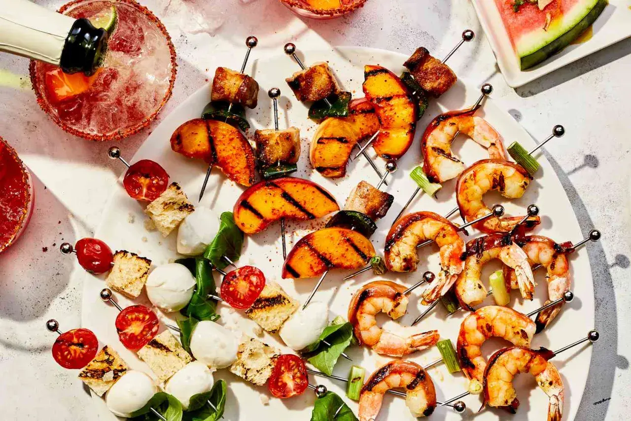 Grilled shrimp, peaches, and caprese skewers are a delicious tapas recept.