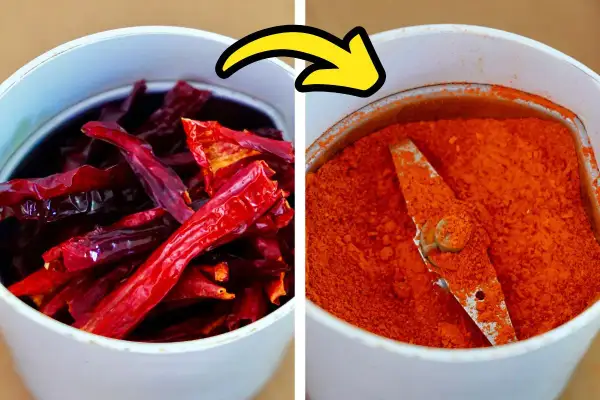 Dried red chilies transform into vibrant paprika powder in a grinder, showing how to make paprika.
