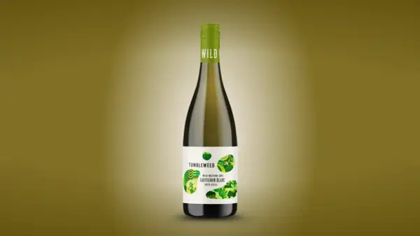 A bottle of Tumbleweed Sauvignon Blanc, a dry white wine from South Africa, with a green cap and a label featuring abstract green leaf patterns.